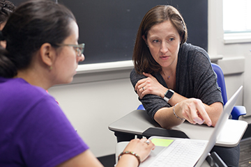 Professor Sara Sood instructing students